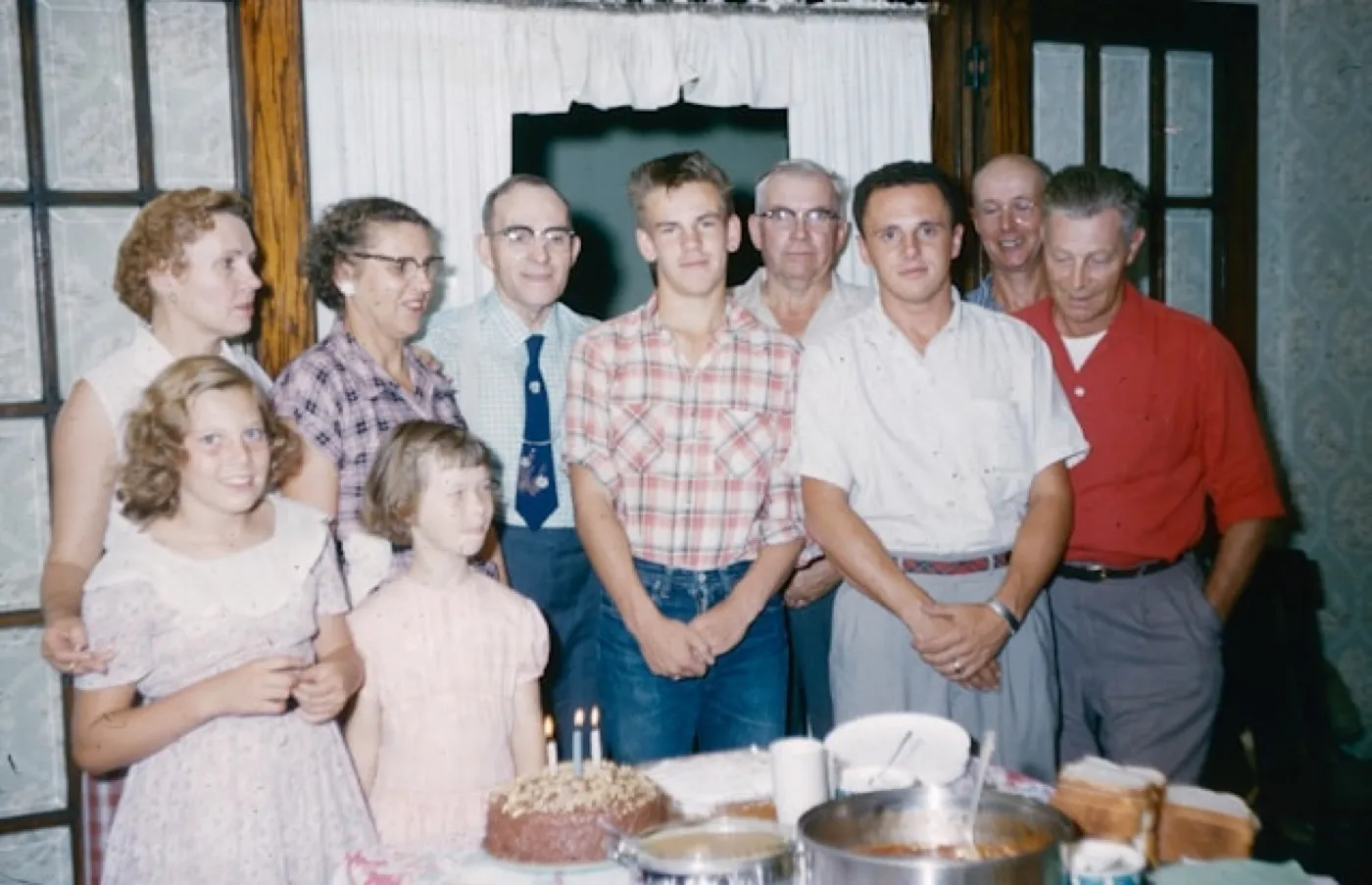 The same family photo around the cake, developed on the Original camera: the colors of the room and the clothes exactly as they were.
